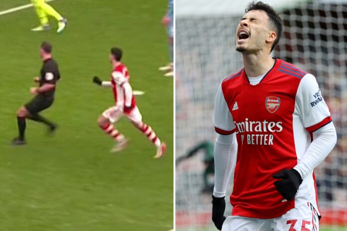 Arsenal fans fume as referee Stuart Attwell 'makes striker's run' and 'screens' Martinelli before his miss vs Man City